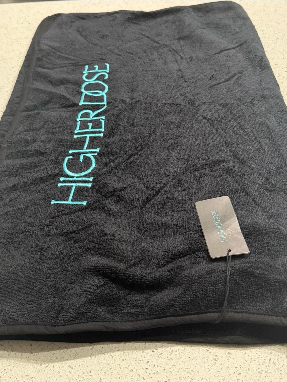 HIGHER DOSE Embroidered Black Bath Towel with Teal Logo